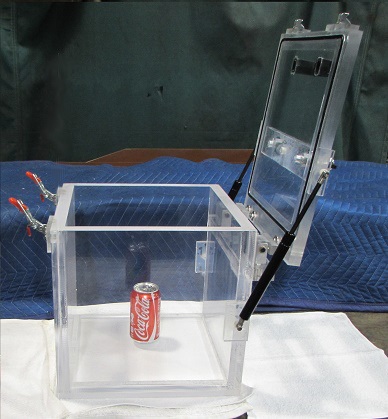 Side view of our Transparent Vacuum Chamber with a Coca Cola can in comparison.